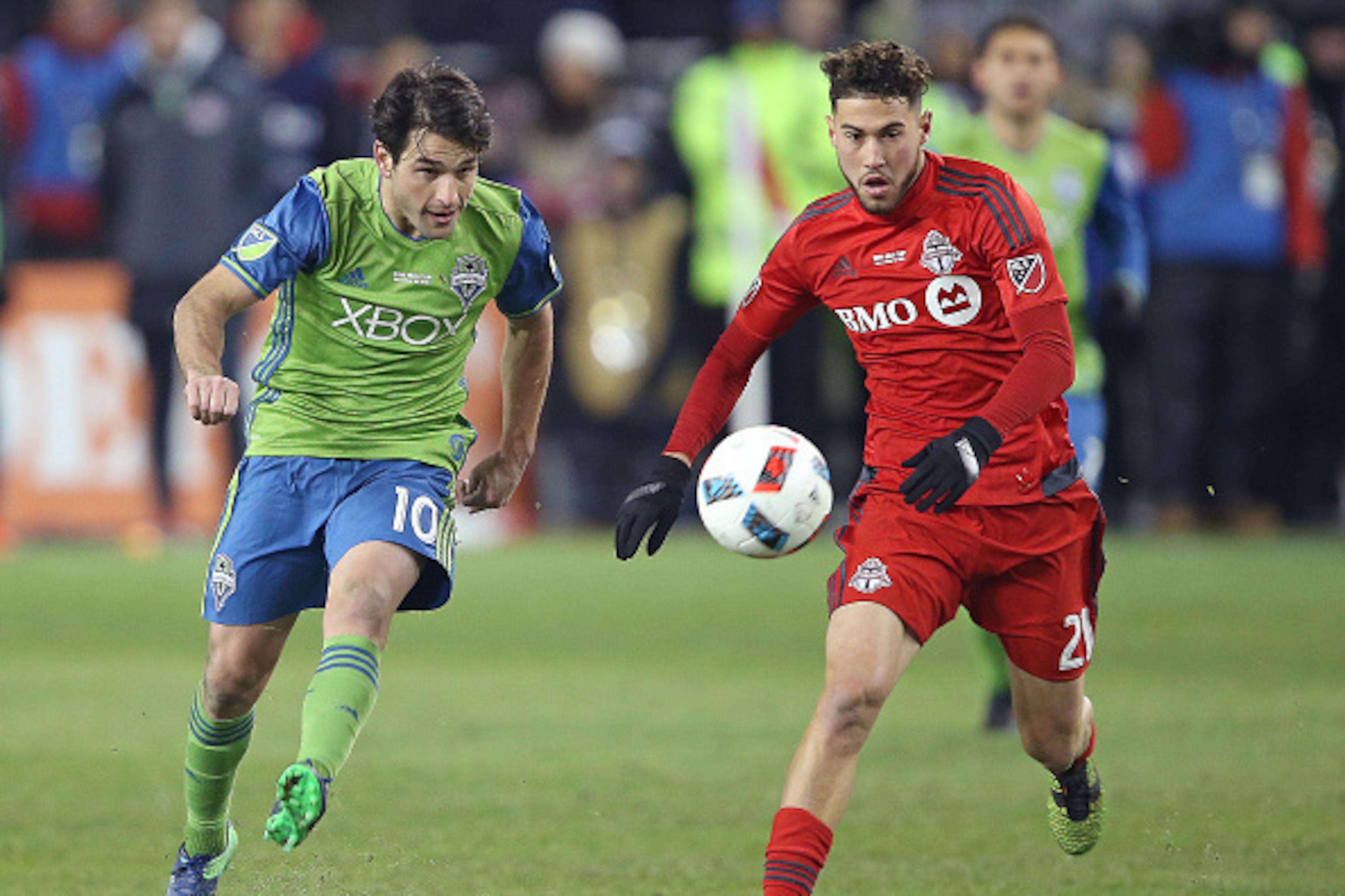 TORONTO, ONTARIO - DECEMBER 10:  Nicolas Lodeiro #10 of the Seattle Sounders plays against Jonathan Osorio #21 of the Toronto FC during the 2016 MLS Cup at BMO Field on December 10, 2016 in Toronto, Ontario, Canada. Seattle defeated Toronto in the 6th rou