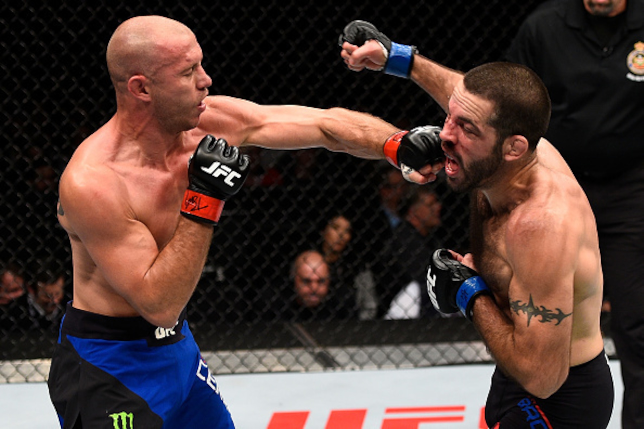 TORONTO, CANADA - DECEMBER 10:  (L-R) Donald Cerrone punches Matt Brown in their welterweight bout during the UFC 206 event inside the Air Canada Centre on December 10, 2016 in Toronto, Ontario, Canada. (Photo by Jeff Bottari/Zuffa LLC/Zuffa LLC via Getty