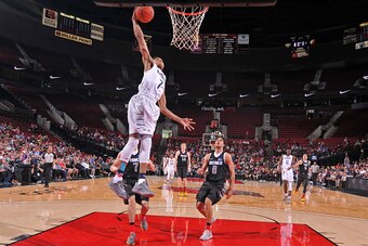 PORTLAND, OR - APRIL 9:  Markelle Fultz #7 of the USA Junior Select Team dunks the ball against the World Select Team during the 2016 Nike Hoop Summit on April 9, 2016 at the MODA Center Arena in Portland, Oregon. NOTE TO USER: User expressly acknowledges