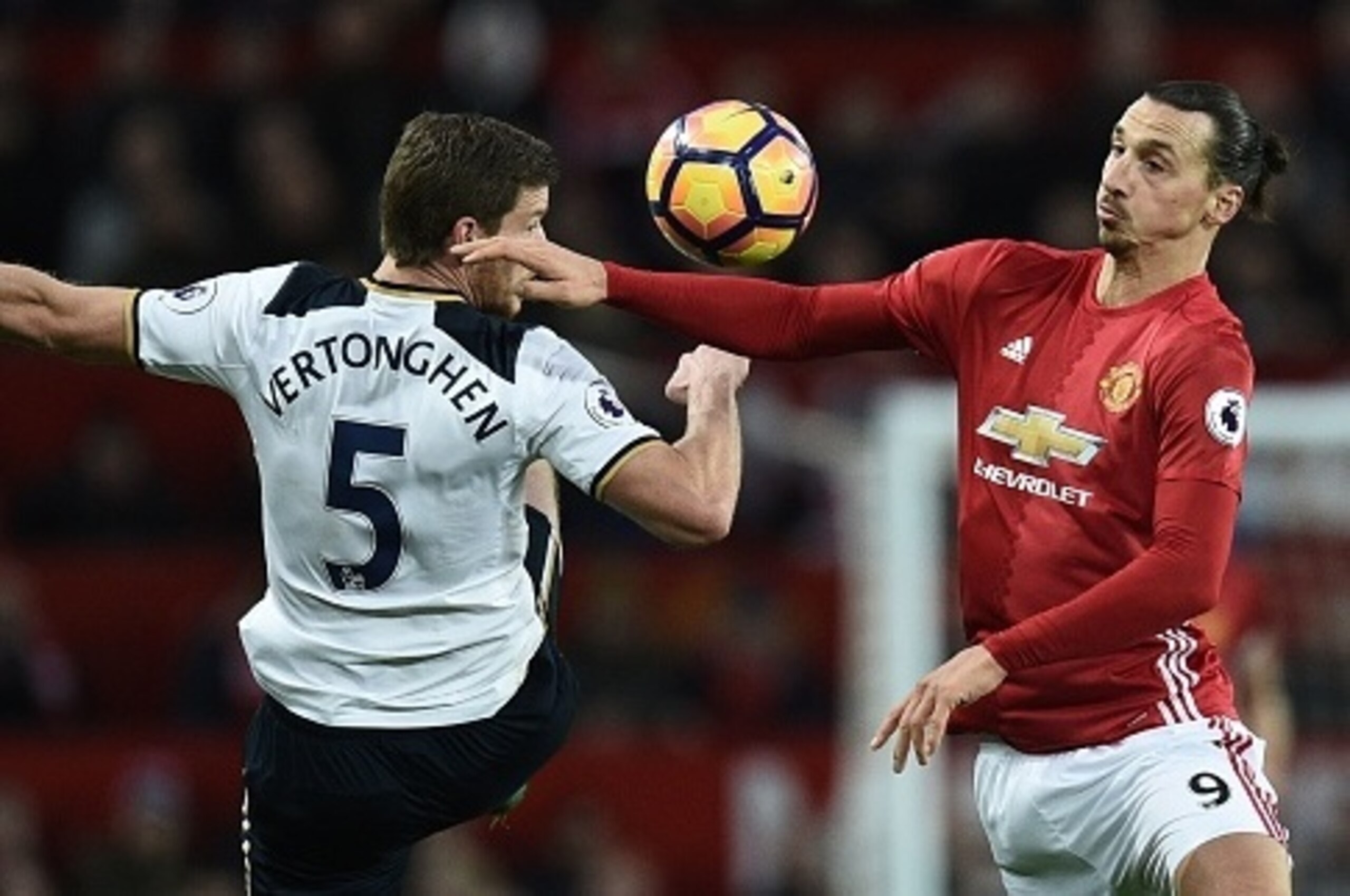 Manchester United's Swedish striker Zlatan Ibrahimovic (R) vies with Tottenham Hotspur's Belgian defender Jan Vertonghen (L) during the English Premier League football match between Manchester United and Tottenham Hotspur at Old Trafford in Manchester, no