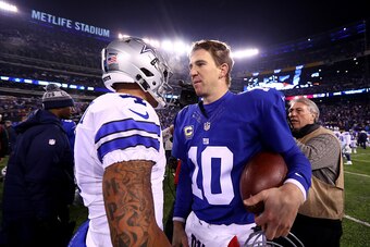 EAST RUTHERFORD, NJ - DECEMBER 11:  Eli Manning #10 of the New York Giants shakes hands with Dak Prescott #4 of the Dallas Cowboys after their game at MetLife Stadium on December 11, 2016 in East Rutherford, New Jersey.  The New York Giants defeated the D