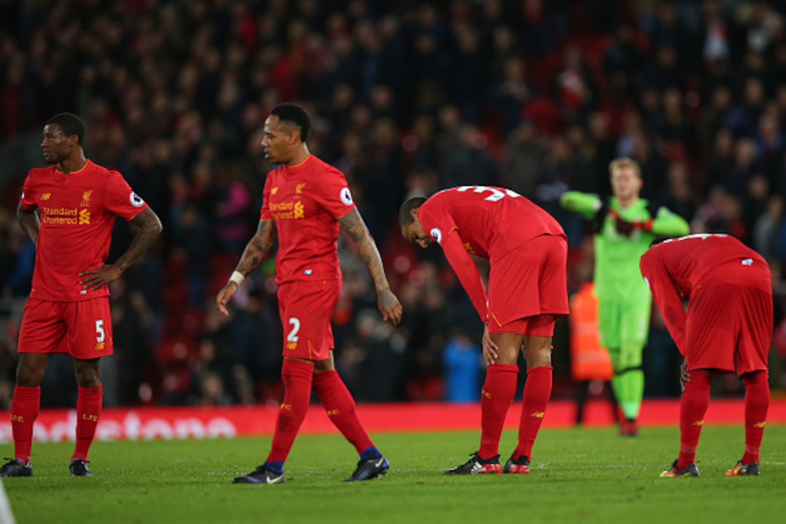 LIVERPOOL, ENGLAND - DECEMBER 11: Liverpool players dejected at full time during the Premier League match between Liverpool and West Ham United at Anfield on December 11, 2016 in Liverpool, England. (Photo by Robbie Jay Barratt - AMA/Getty Images)