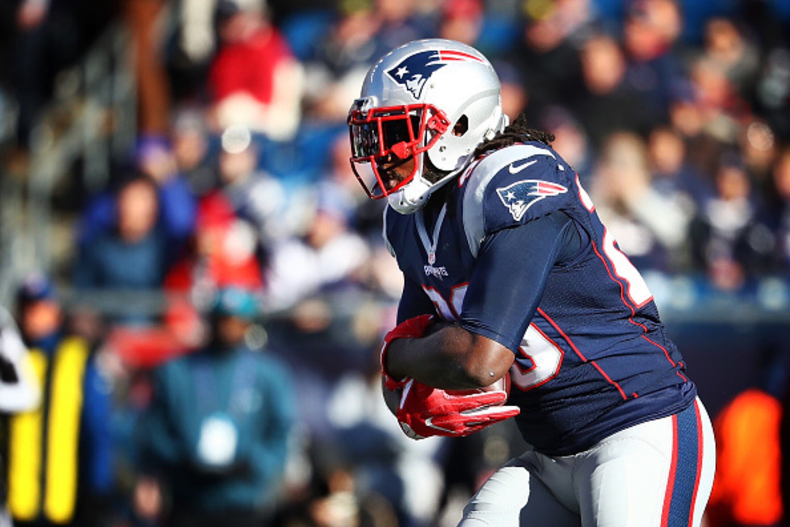 FOXBORO, MA - DECEMBER 04:  LeGarrette Blount #29 of the New England Patriots runs the ball during the first half against the Los Angeles Rams at Gillette Stadium on December 4, 2016 in Foxboro, Massachusetts.  (Photo by Adam Glanzman/Getty Images)