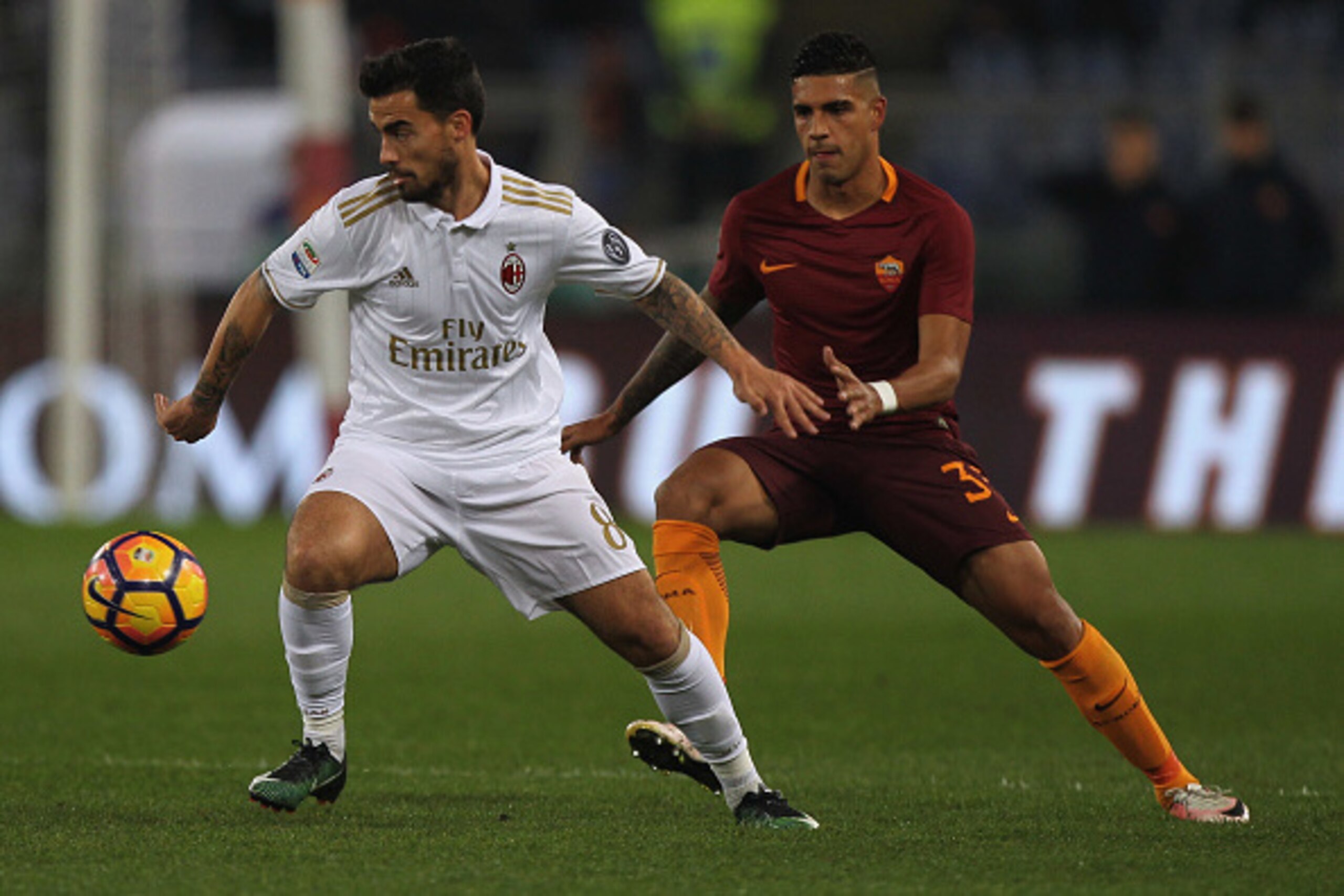 ROME, ITALY - DECEMBER 12: Emerson AS Roma competes for the ball with Suso of AC Milan during the Serie A match between AS Roma and AC Milan at Stadio Olimpico on December 12, 2016 in Rome, Italy. (Photo by Paolo Bruno/Getty Images ) ROME, ITALY - DECEMBER 12: Emerson AS Roma competes for the ball with Suso of AC Milan during the Serie A match between AS Roma and AC Milan at Stadio Olimpico on December 12, 2016 in Rome, Italy. (Photo by Paolo Bruno/Getty Images )