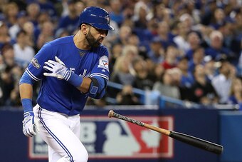 TORONTO, ON - OCTOBER 9: Jose Bautista #19 of the Toronto Blue Jays reacts after flying out for the third out of the seventh inning against the Texas Rangers during game three of the American League Division Series at Rogers Centre on October 9, 2016 in T