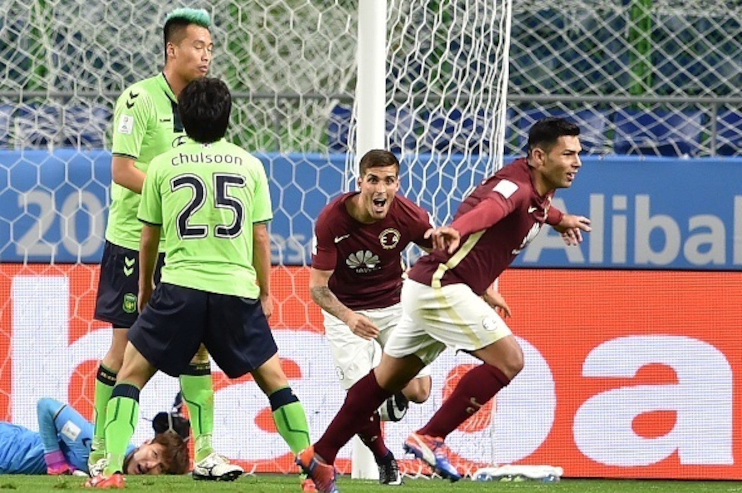 Club America forward Silvio Romero (R, #9) reacts following his goal during the Club World Cup football match between Jeonbuk Hyundai and Club America in Suita, Osaka prefecture on December 11, 2016. / AFP / KAZUHIRO NOGI        (Photo credit should read 