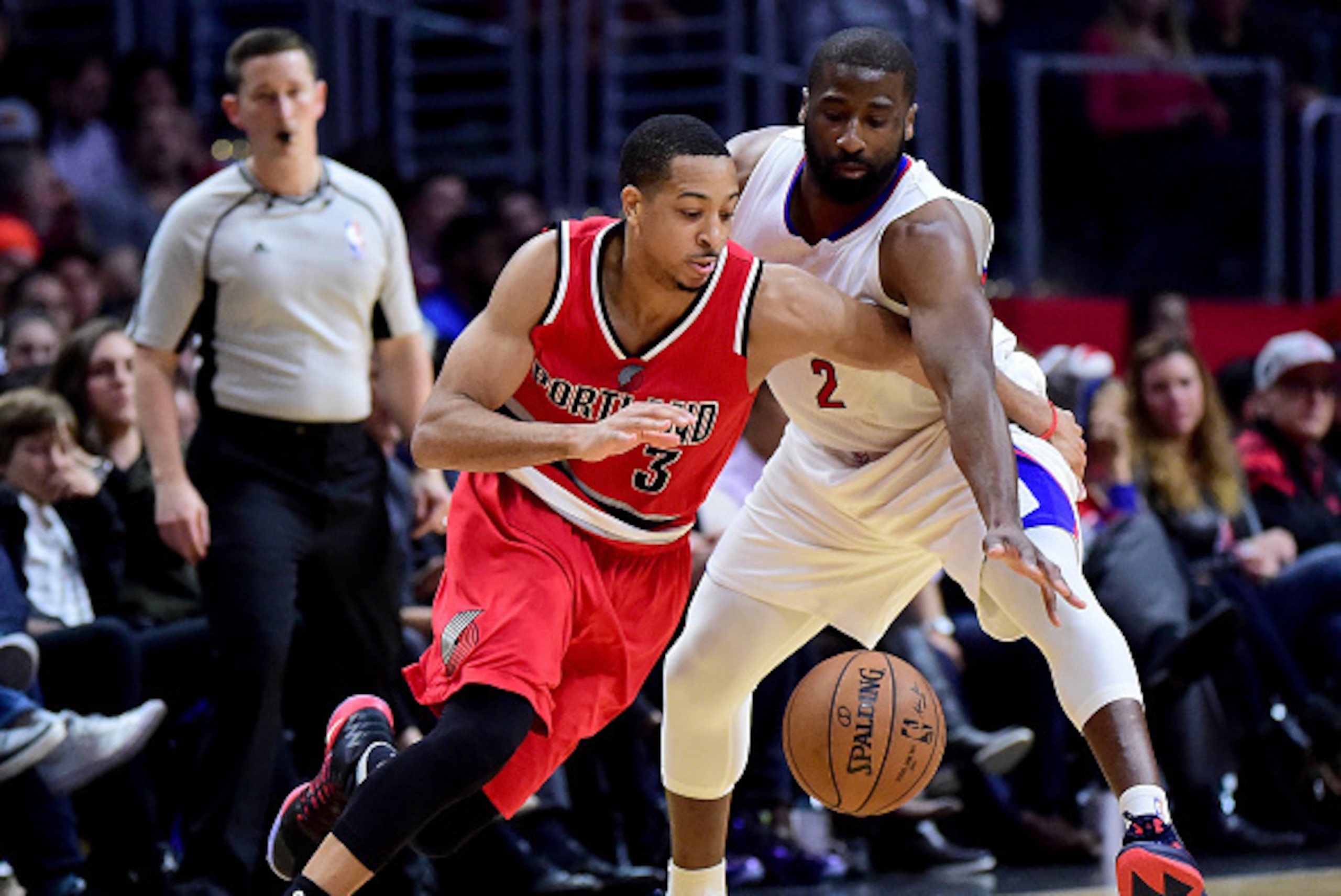 LOS ANGELES, CA - DECEMBER 12:  C.J. McCollum #3 of the Portland Trail Blazers is guarded by Raymond Felton #2 of the LA Clippers during a 121-120 Clipper win at Staples Center on December 12, 2016 in Los Angeles, California.  NOTE TO USER: User expressly