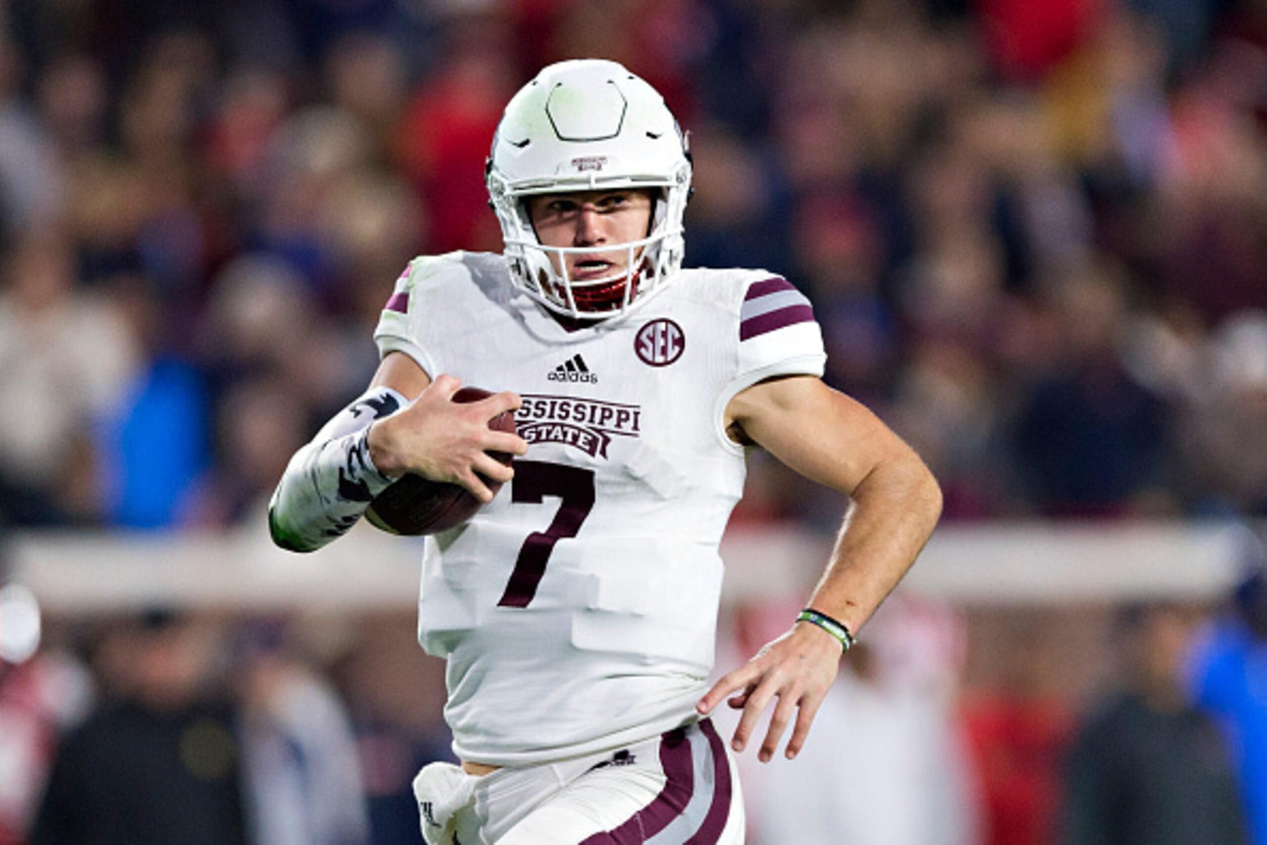 OXFORD, MS - NOVEMBER 26:  Nick Fitzgerald #7 of the Mississippi State Bulldogs runs the ball for a touchdown during a game against the Mississippi Rebels at Vaught-Hemingway Stadium on November 26, 2016 in Oxford, Mississippi.  The Bulldogs defeated the 