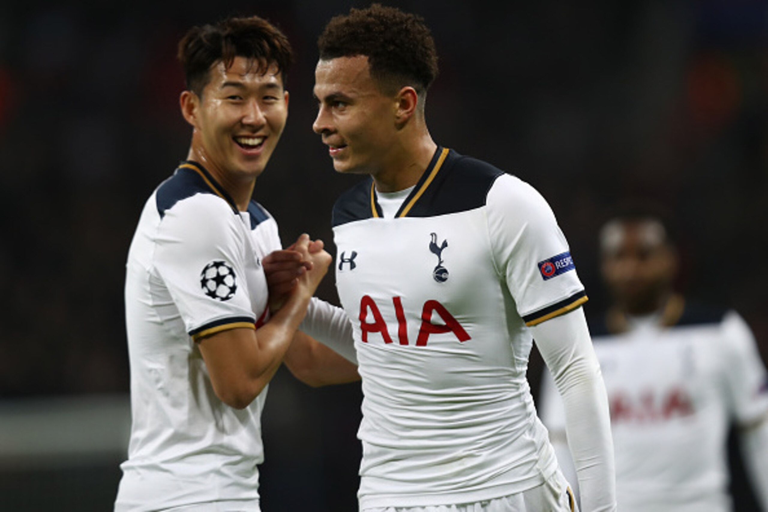 LONDON, ENGLAND - DECEMBER 07: Dele Alli of Tottenham Hotspur (R) celebrates scoring his sides first goal with Heung-Min Son of Tottenham Hotspur (L) during the UEFA Champions League Group E match between Tottenham Hotspur FC and PFC CSKA Moskva at Wemble
