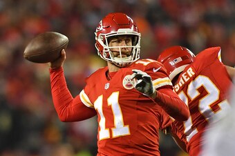 KANSAS CITY, MO - DECEMBER 08:  Quarterback Alex Smith #11 of the Kansas City Chiefs throws a pass against the Oakland Raiders during the first half on December 8, 2016 at Arrowhead Stadium in Kansas City, Missouri.  (Photo by Peter G. Aiken/Getty Images)