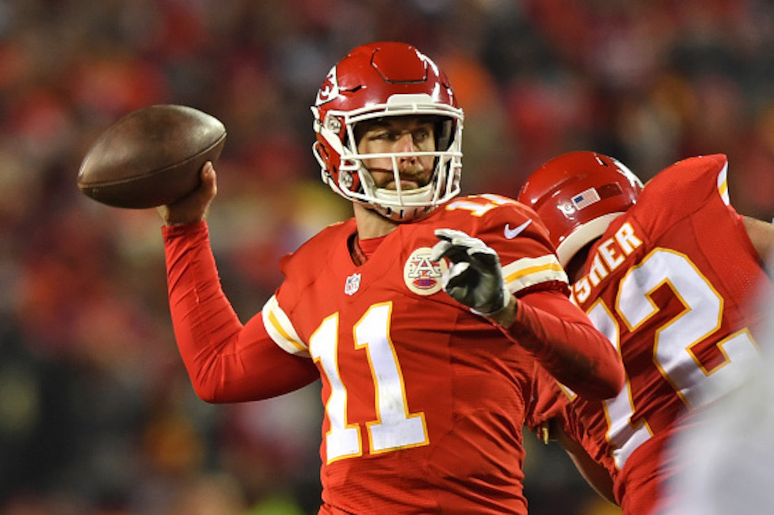 KANSAS CITY, MO - DECEMBER 08:  Quarterback Alex Smith #11 of the Kansas City Chiefs throws a pass against the Oakland Raiders during the first half on December 8, 2016 at Arrowhead Stadium in Kansas City, Missouri.  (Photo by Peter G. Aiken/Getty Images)