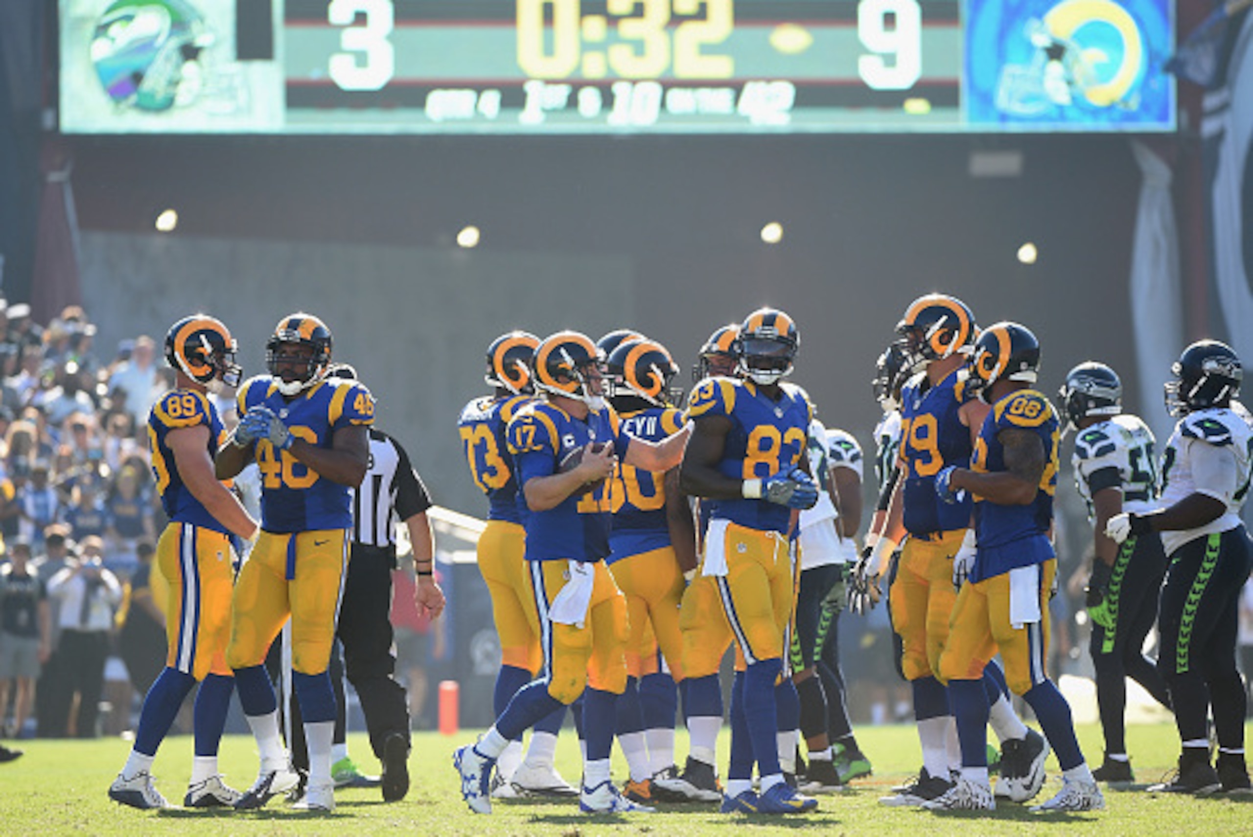 LOS ANGELES, CA - SEPTEMBER 18:  Quarterback Case Keenum #17 of the Los Angeles Rams celebrates with his team after their 9-3 victory over the Seattle Seahawks in the home opening NFL game at Los Angeles Coliseum on September 18, 2016 in Los Angeles, Cali