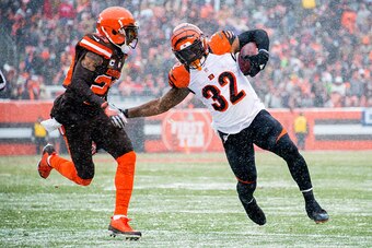 CLEVELAND, OH - DECEMBER 11: Running back Jeremy Hill #32 of the Cincinnati Bengals rushes against cornerback Joe Haden #23 of the Cleveland Browns during the first half at FirstEnergy Stadium on December 11, 2016 in Cleveland, Ohio. (Photo by Jason Mille