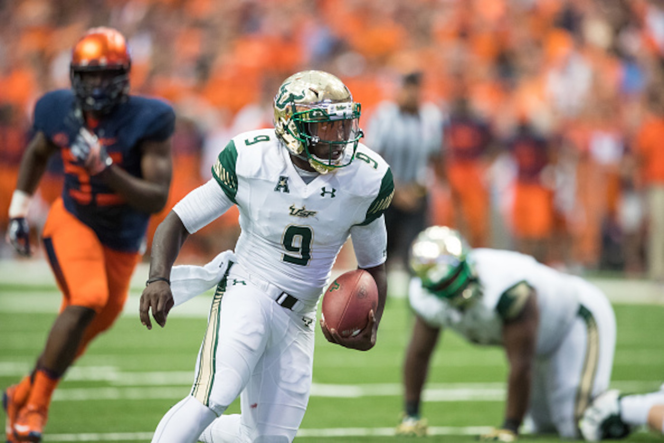 SYRACUSE, NY - SEPTEMBER 17:  Quinton Flowers #9 of the South Florida Bulls carries the ball during the game against the Syracuse Orange on September 17, 2016 at The Carrier Dome in Syracuse, New York. South Florida defeats Syracuse 45-20.  (Photo by Bret
