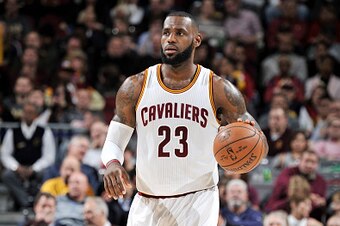 CLEVELAND, OH - DECEMBER 13:  LeBron James #23 of the Cleveland Cavaliers brings the ball up court against the Memphis Grizzlies during the game on December 13, 2016 at Quicken Loans Arena in Cleveland, Ohio. NOTE TO USER: User expressly acknowledges and 