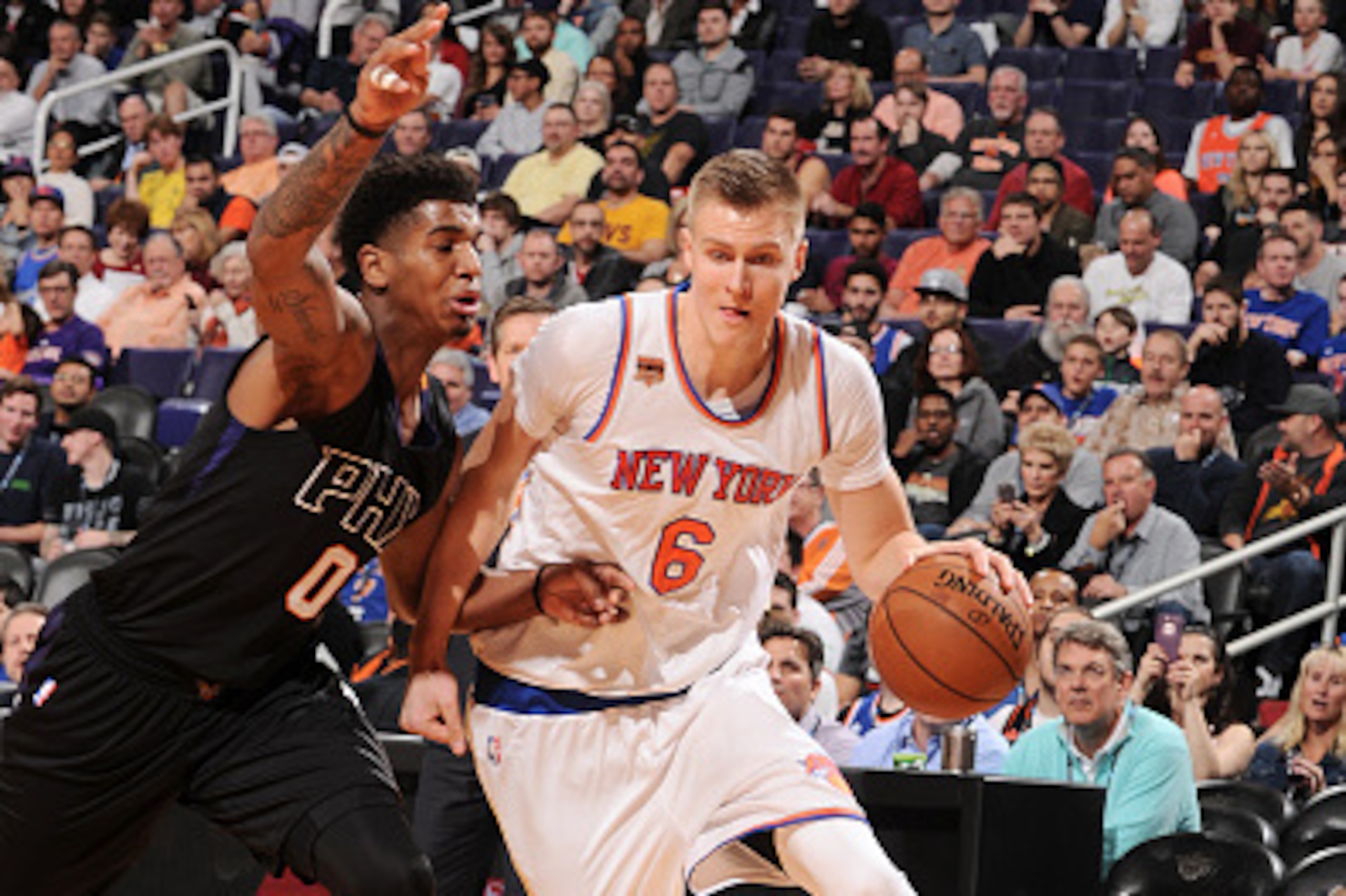 PHOENIX, AZ - DECEMBER 13:  Kristaps Porzingis #6 of the New York Knicks drives to the basket during a game against the Phoenix Suns on December 13, 2016 at Talking Stick Resort Arena in Phoenix, Arizona. NOTE TO USER: User expressly acknowledges and agre