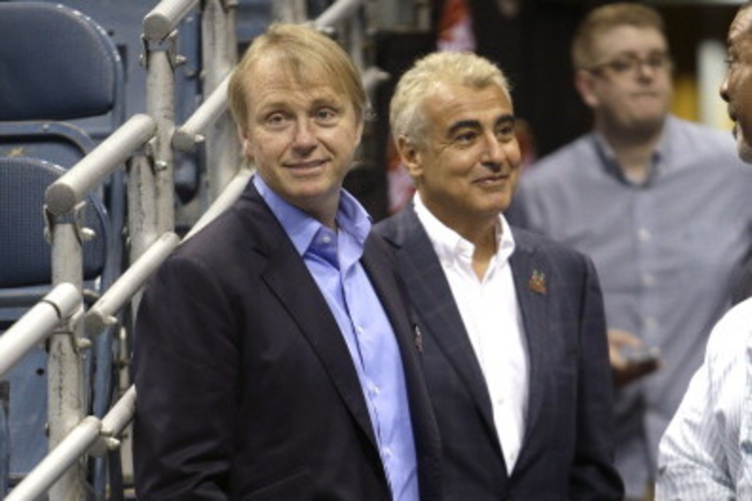 MILWAUKEE, WI - JULY 2: (L-R) Owners Wesley Edens (L) & Marc Lasry (2L) await the announcement of their new head coach Jason Kidd to the Milwaukee Bucks at BMO Harris Bradley Center on July 2, 2014 in Milwaukee, Wisconsin. NOTE TO USER: User expressly ack