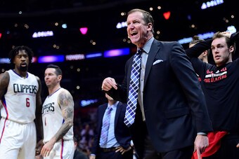 LOS ANGELES, CA - DECEMBER 12:  Terry Stotts of the Portland Trail Blazers argues a foul call on his team in front of DeAndre Jordan #6 and J.J. Redick #4 of the LA Clippers during a 121-120 Clipper win at Staples Center on December 12, 2016 in Los Angele