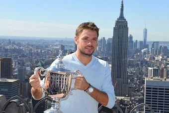 US Open men's singles champion Stan Wawrinka of Switzerland poses with his trophy on Top of the Rock Observation Deck at Rockefeller Center in New York on September 12, 2016. / AFP / ANGELA WEISS        (Photo credit should read ANGELA WEISS/AFP/Getty Ima