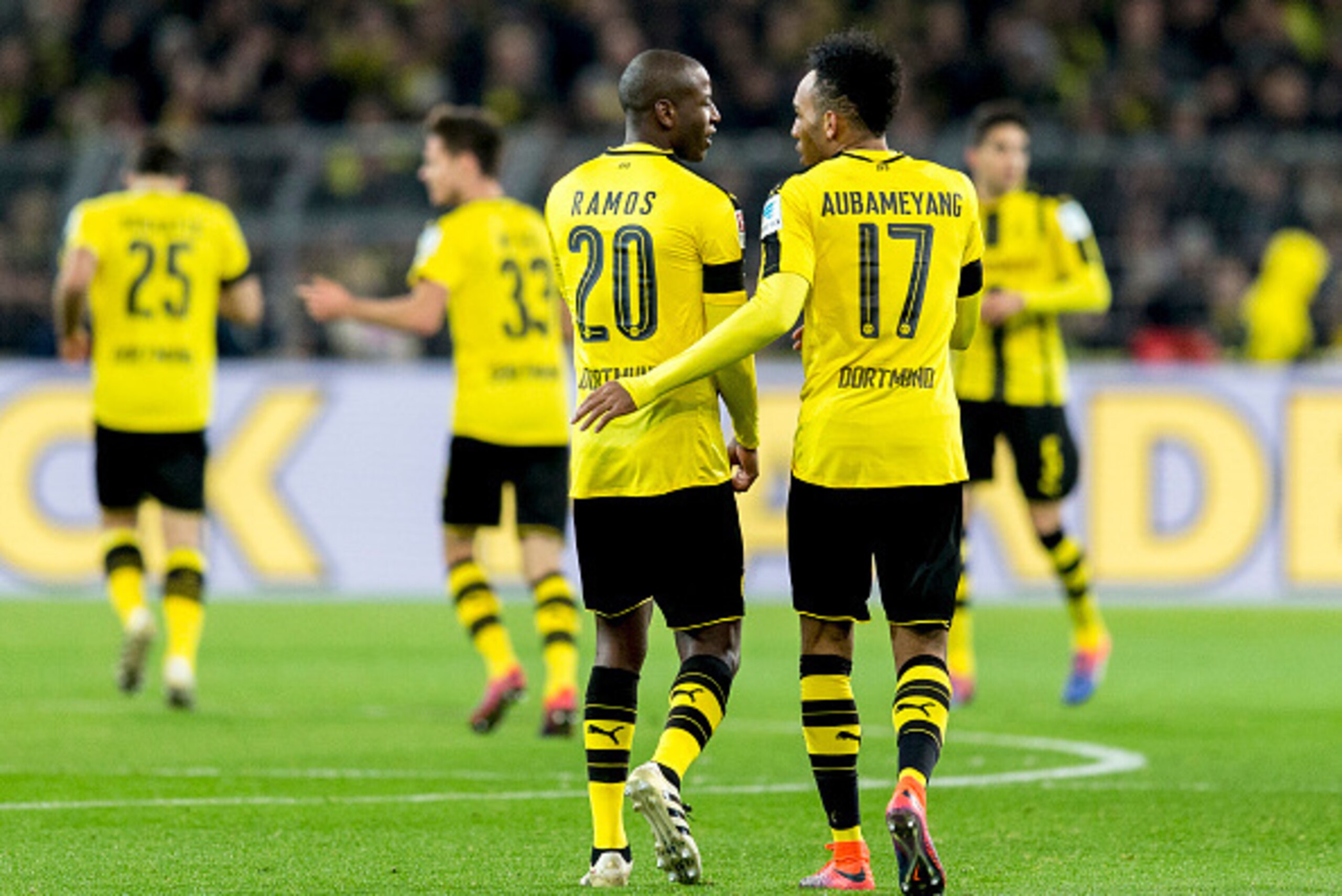 DORTMUND, GERMANY - NOVEMBER 19:  Pierre-Emerick Aubameyang of Borussia Dortmund and Adrian Ramos of Borussia Dortmund hug during the Bundesliga match between Borussia Dortmund and Bayern Muenchen at Signal Iduna Park on November 19, 2016 in Dortmund, Ger