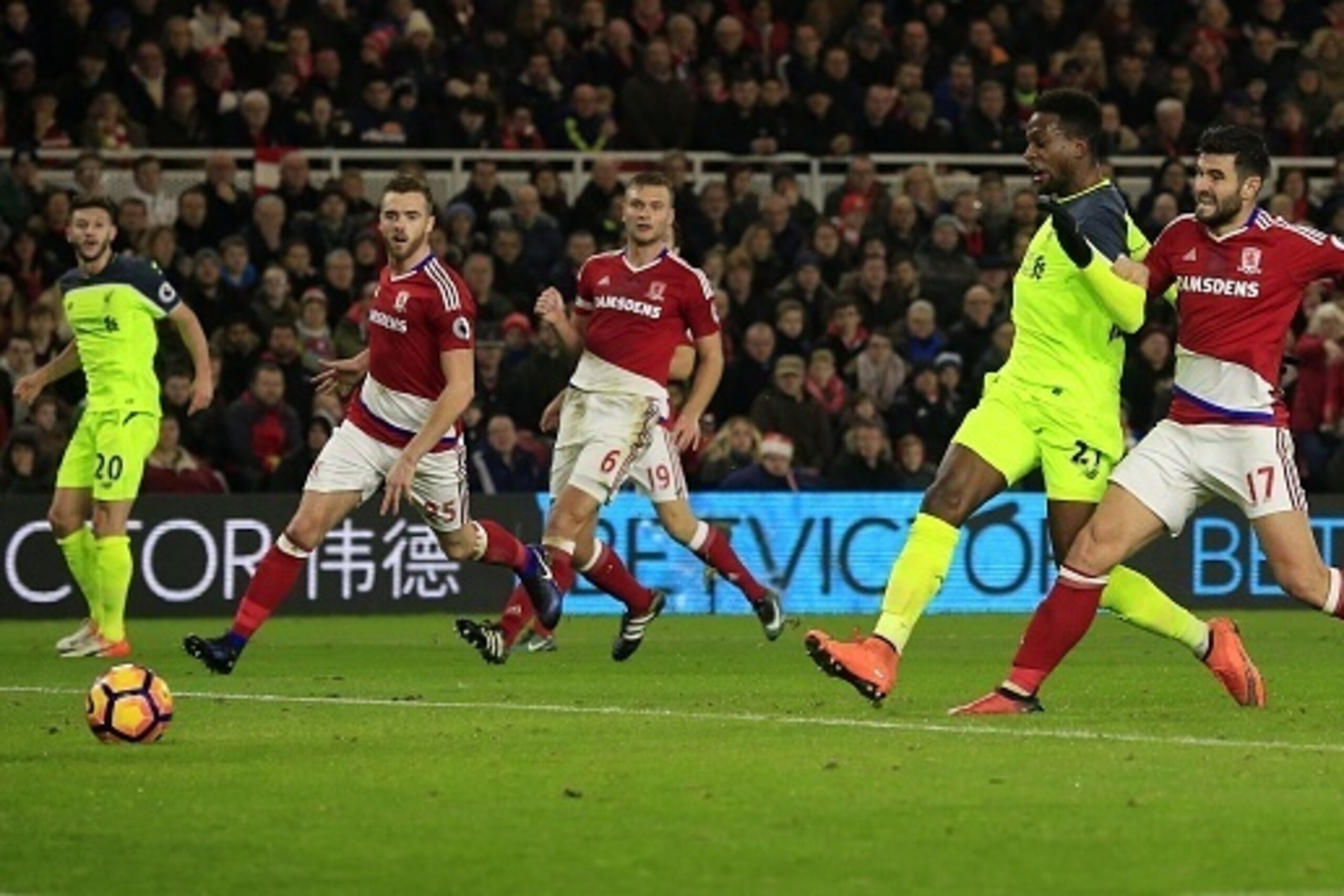 Liverpool's Belgian striker Divock Origi (2R) scores his team's second goal past Middlesbrough's Spanish defender Antonio Barragan during the English Premier League football match between Middlesbrough and Liverpool at Riverside Stadium in Middlesbrough, 