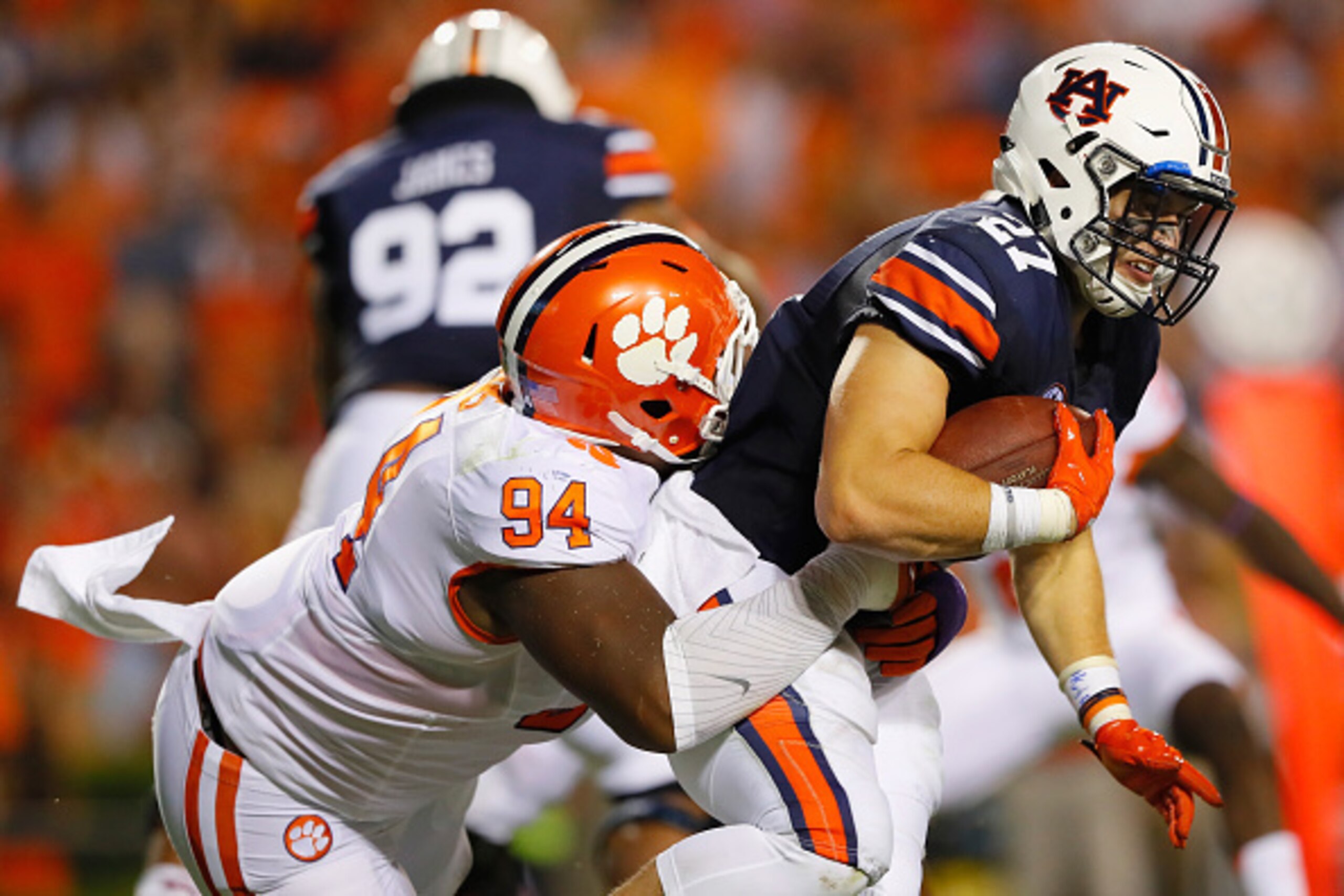 AUBURN, AL - SEPTEMBER 03: Chandler Cox #27 of the Auburn Tigers carries the ball against Carlos Watkins #94 of the Clemson Tigers during the second half at Jordan Hare Stadium on September 3, 2016 in Auburn, Alabama. (Photo by Kevin C. Cox/Getty Images AUBURN, AL - SEPTEMBER 03: Chandler Cox #27 of the Auburn Tigers carries the ball against Carlos Watkins #94 of the Clemson Tigers during the second half at Jordan Hare Stadium on September 3, 2016 in Auburn, Alabama. (Photo by Kevin C. Cox/Getty Images