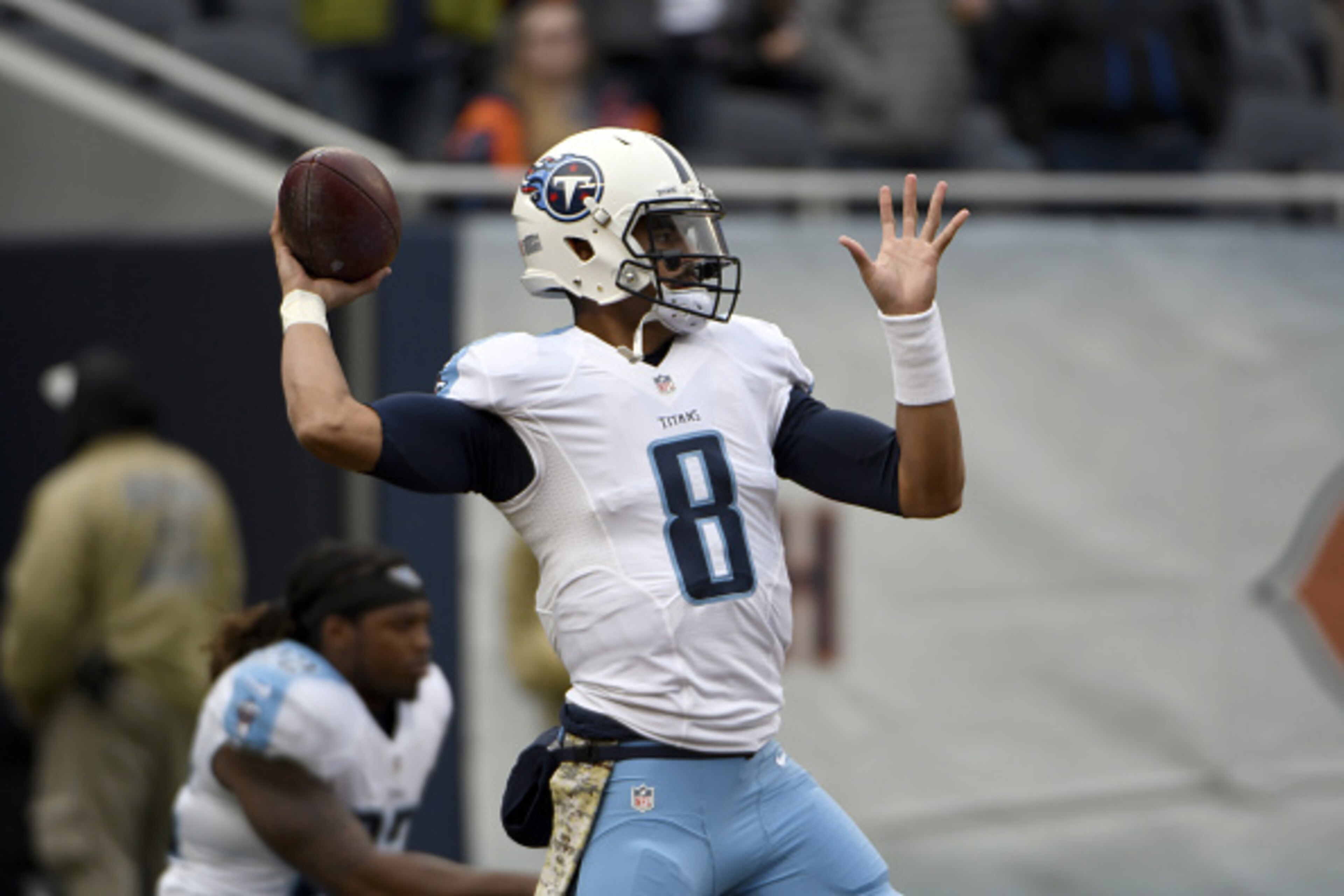CHICAGO, IL- NOVEMBER 27:  Marcus Mariota #8 of the Tennessee Titans warms up before the game against the Chicago Bears on November 27, 2016 at Soldier Field in Chicago, Illinois.  (Photo by David Banks/Getty Images)