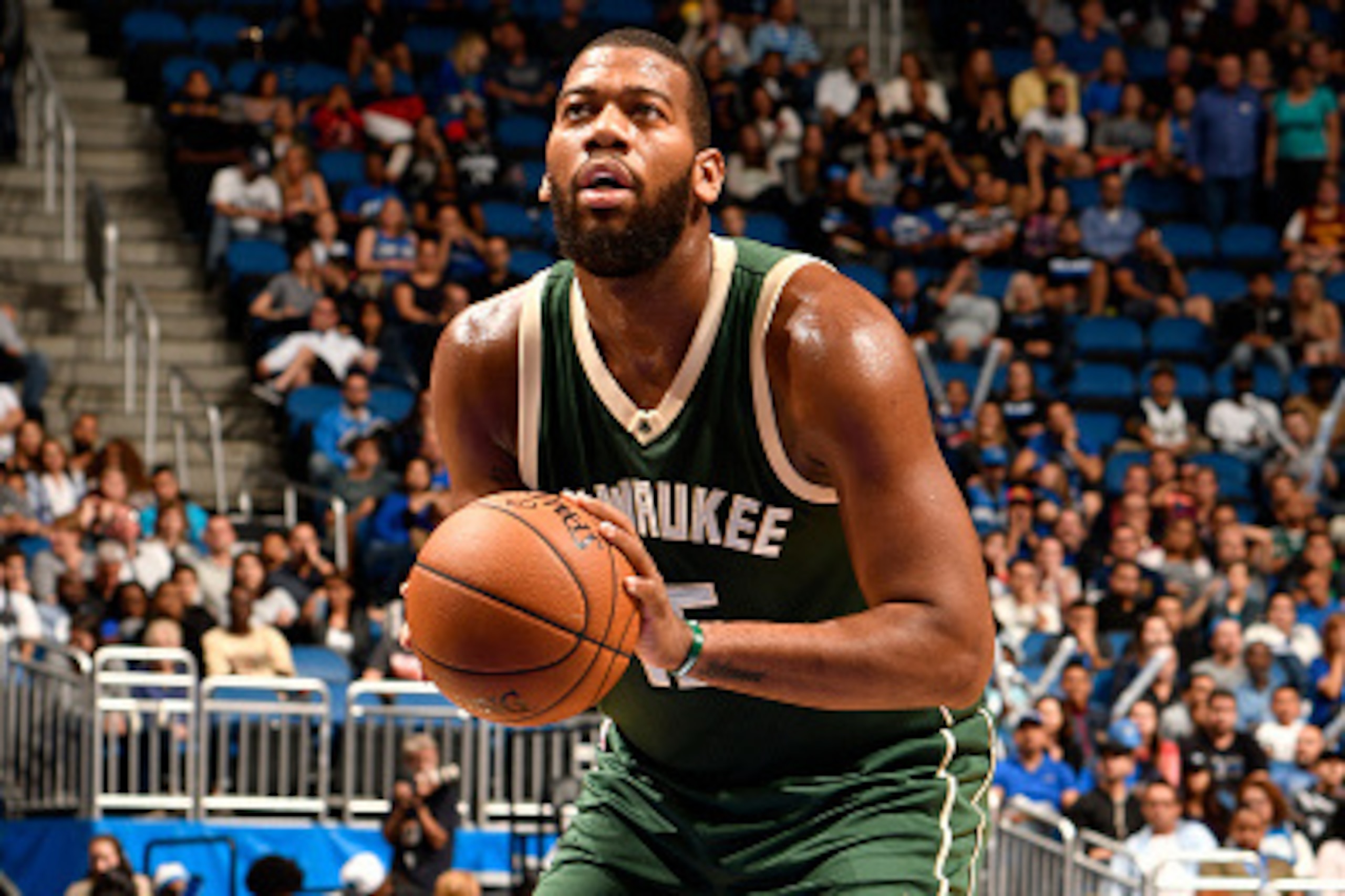 ORLANDO, FL - NOVEMBER 27: Greg Monroe #15 of the Milwaukee Bucks shoots a free throw against the Orlando Magic on November 27, 2016 at Amway Center in Orlando, Florida. NOTE TO USER: User expressly acknowledges and agrees that, by downloading and or usin