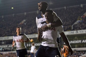 Tottenham Hotspur's Kenyan midfielder Victor Wanyama (R) celebrates scoring his team's third goal with Tottenham Hotspur's French midfielder Moussa Sissoko during the English Premier League football match between Tottenham Hotspur and Hull City at White H