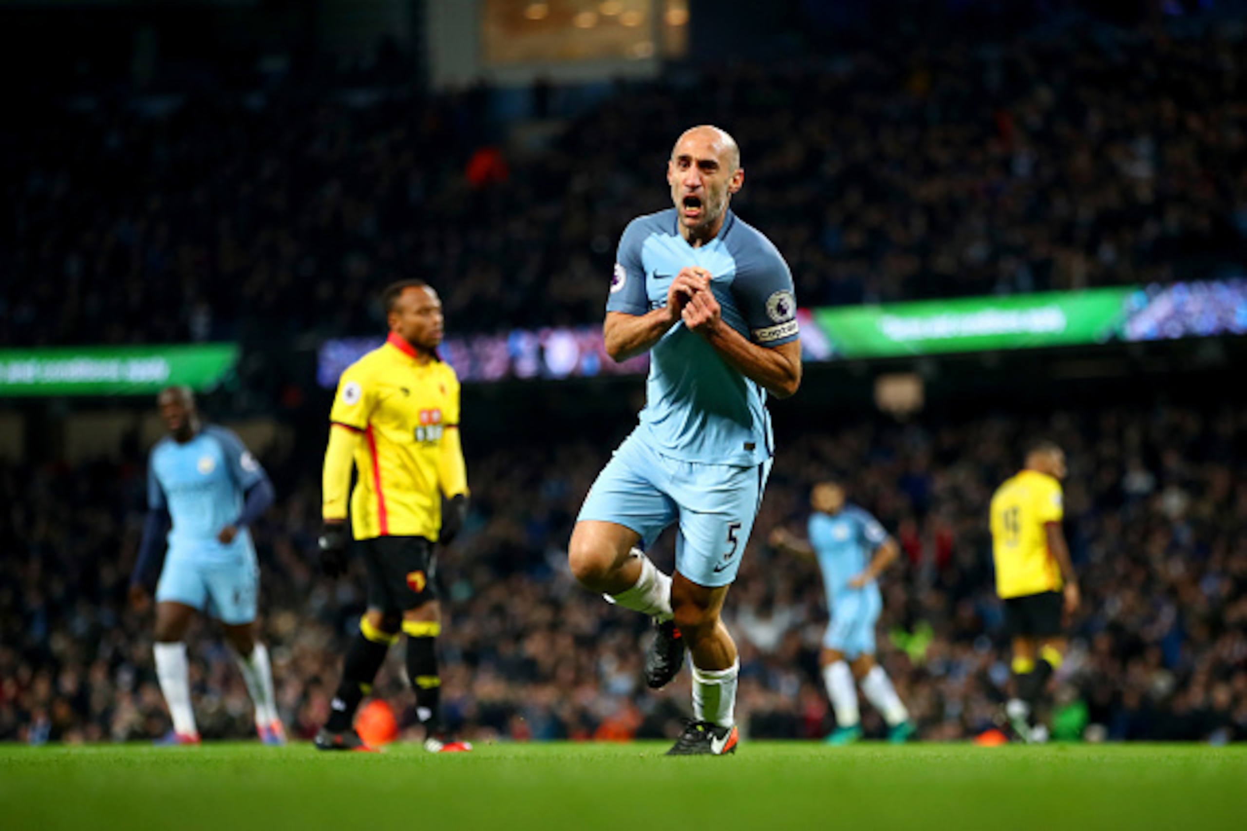 MANCHESTER, ENGLAND - DECEMBER 14: Pablo Zabaleta of Manchester City celebrates scoring the opening goal during the Premier League match between Manchester City and Watford at Etihad Stadium on December 14, 2016 in Manchester, England.  (Photo by Clive Br