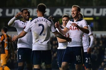 Tottenham Hotspur's English defender Danny Rose (L) Tottenham Hotspur's English defender Kyle Walker (C) and Tottenham Hotspur's English striker Harry Kane celebrate after Tottenham Hotspur's Danish midfielder Christian Eriksen scored his team's second go