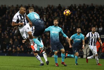 WEST BROMWICH, ENGLAND - DECEMBER 14: Jose Salomon Rondon of West Bromwich Albion (L) scores his sides first goal with a header during the Premier League match between West Bromwich Albion and Swansea City at The Hawthorns on December 14, 2016 in West Bro