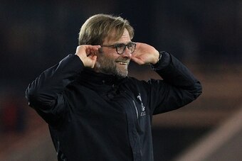 Liverpool's German manager Jurgen Klopp gestures to the fans following the English Premier League football match between Middlesbrough and Liverpool at Riverside Stadium in Middlesbrough, northeast England on December 14, 2016.
Liverpool won the match 3-0