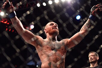 LAS VEGAS, NV - AUGUST 20:  Conor McGregor of Ireland gestures to the crowd after finishing five rounds against Nate Diaz in their welterweight bout during the UFC 202 event at T-Mobile Arena on August 20, 2016 in Las Vegas, Nevada. (Photo by Jeff Bottari