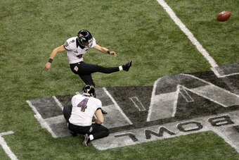 NEW ORLEANS, LA - FEBRUARY 03:  Justin Tucker #9 of the Baltimore Ravens attempts a kick from the hold of Sam Koch #4 against the San Francisco 49ers during Super Bowl XLVII at the Mercedes-Benz Superdome on February 3, 2013 in New Orleans, Louisiana.  (P