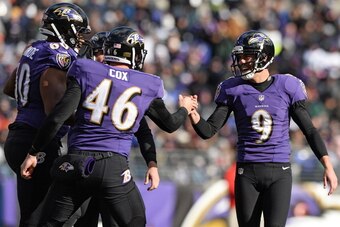 BALTIMORE, MD - NOVEMBER 24: Kicker Justin Tucker #9 of the Baltimore Ravens celebrates with long snapper Morgan Cox #46 of the Baltimore Ravens after kicking a field goal against the New York Jets in the first quarter at M&T Bank Stadium on November 24, 
