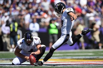 BALTIMORE, MD - SEPTEMBER 07: Kicker Justin Tucker #9 of the Baltimore Ravens attempts a field goal against the Cincinnati Bengals at M&T Bank Stadium on September 7, 2014 in Baltimore, Maryland. The Cincinnati Bengals won, 23-16. (Photo by Patrick Smith/