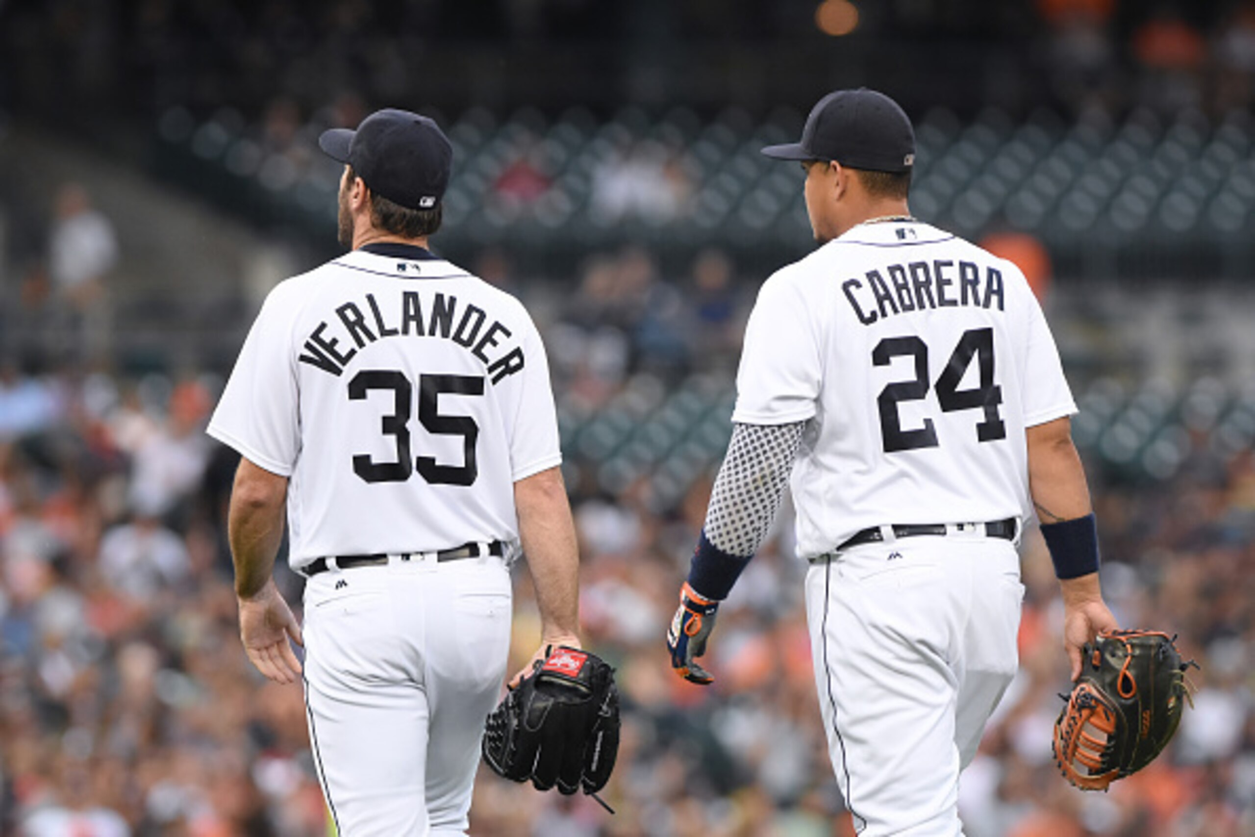 DETROIT, MICHIGAN - JULY 30:  Justin Verlander #35 and Miguel Cabrera #24 of the Detroit Tigers walk off the field together during the game against the Houston Astros at Comerica Park on July 30, 2016 in Detroit, Michigan. The Tigers defeated the Astros 3