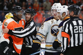 PHILADELPHIA, PA - OCTOBER 25:  Referees seperate Wayne Simmonds #17 of the Philadelphia Flyers during an argument in the third period against the Buffalo Sabres at Wells Fargo Center on October 25, 2016 in Philadelphia, Pennsylvania.  (Photo by Michael R