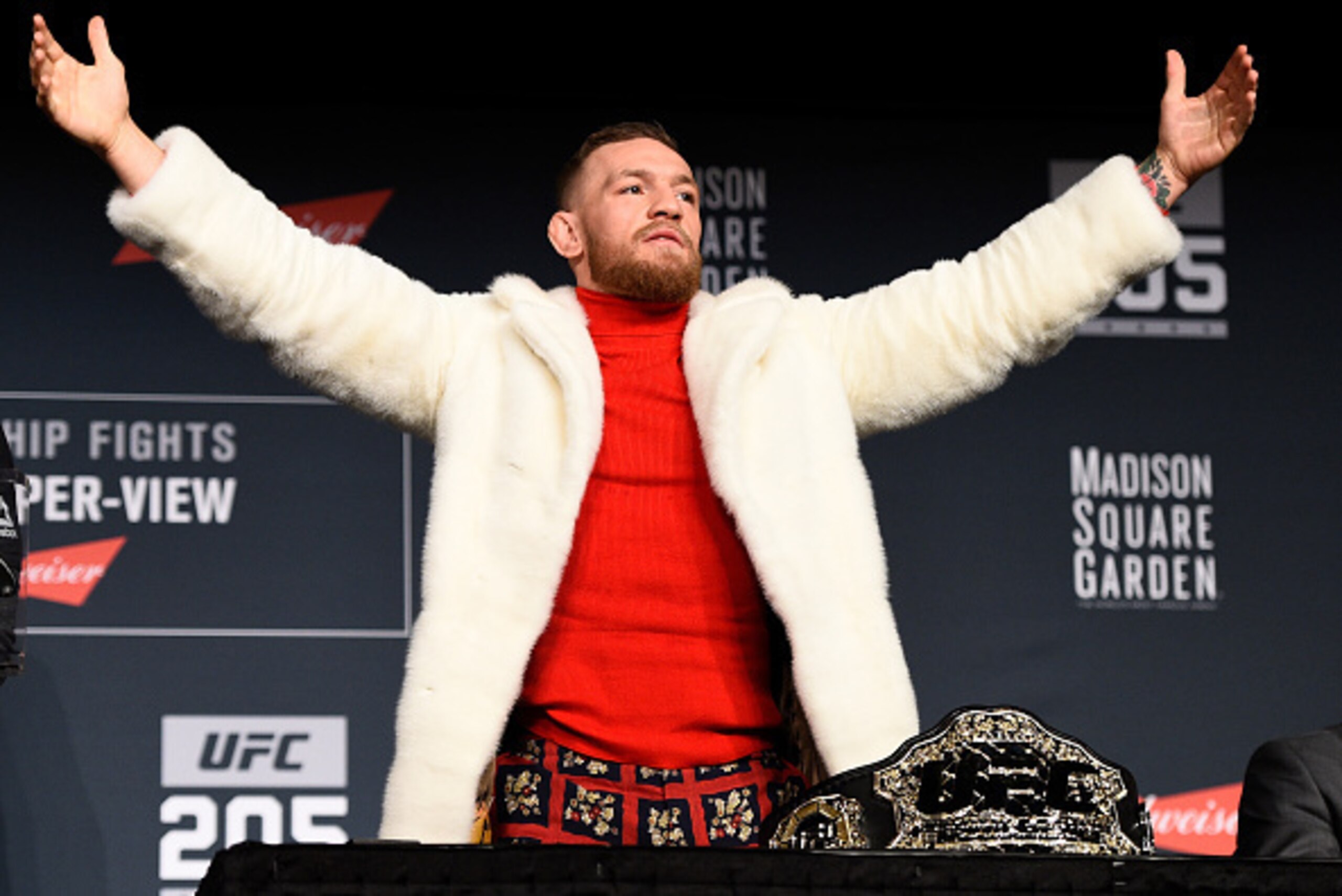 NEW YORK, NY - NOVEMBER 10: UFC featherweight champion Conor McGregor of Ireland interacts with fans and media during the UFC 205 press conference inside The Theater at Madison Square Garden on November 10, 2016 in New York City. (Photo by Jeff Bottari/Z NEW YORK, NY - NOVEMBER 10: UFC featherweight champion Conor McGregor of Ireland interacts with fans and media during the UFC 205 press conference inside The Theater at Madison Square Garden on November 10, 2016 in New York City. (Photo by Jeff Bottari/Z