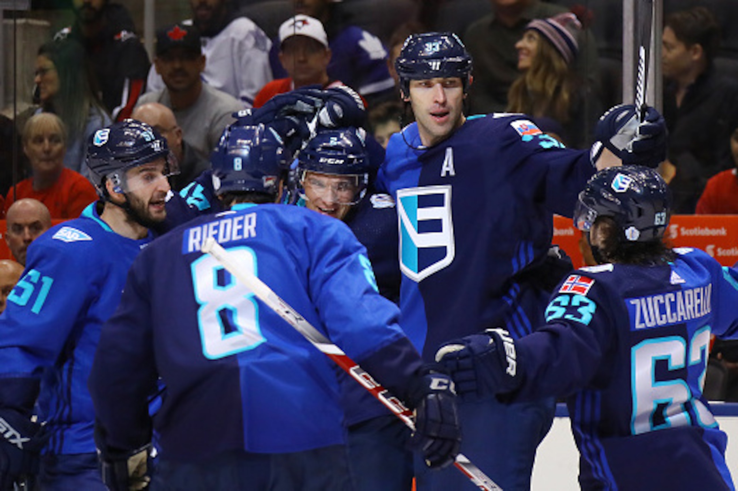 TORONTO, ON - SEPTEMBER 29:  Zdeno Chara #33 of Team Europe is congratulated by his teammates after scoring a first period goal against Team Canada during Game Two of the World Cup of Hockey final series at the Air Canada Centre on September 29, 2016 in T