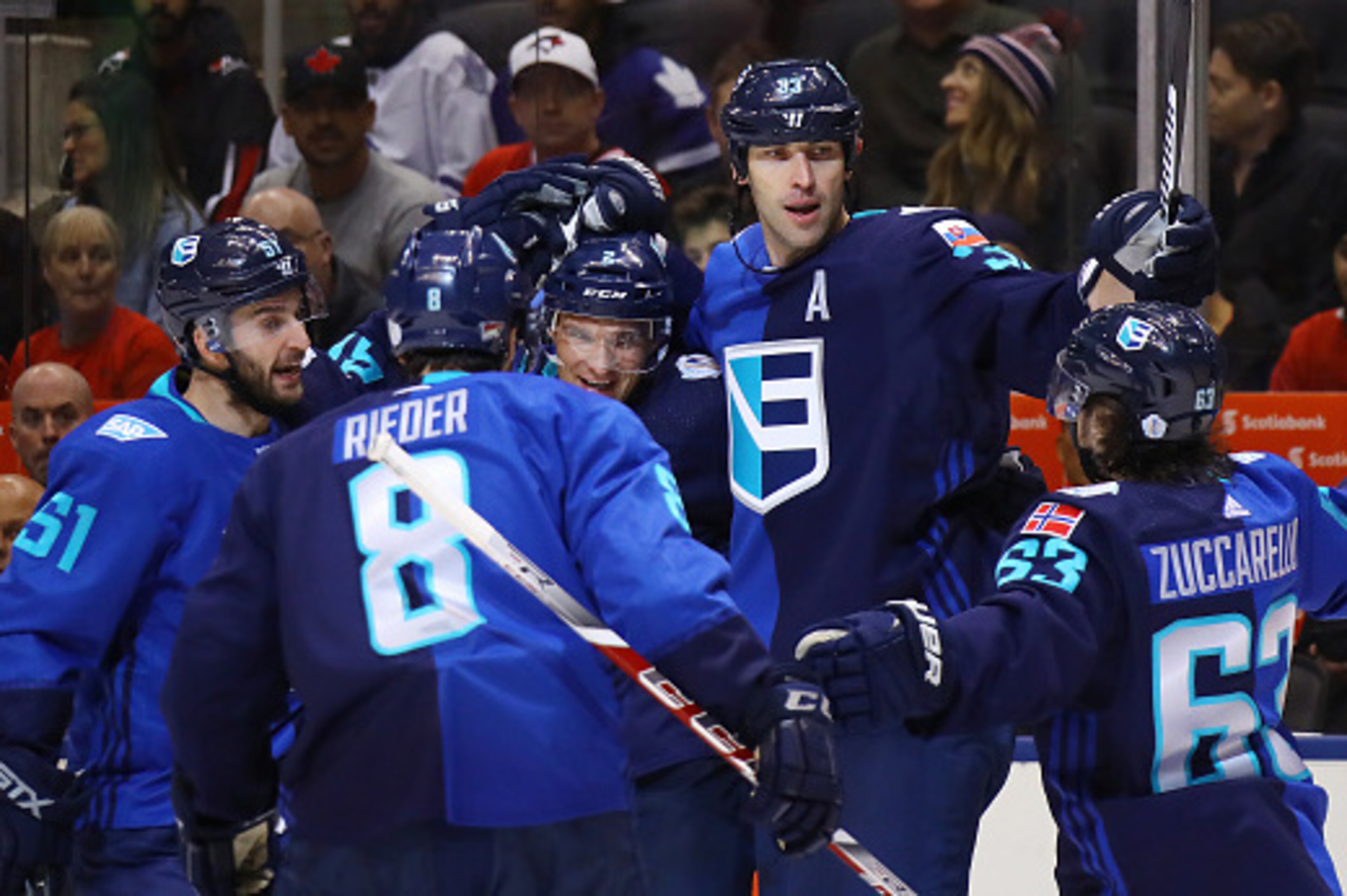TORONTO, ON - SEPTEMBER 29:  Zdeno Chara #33 of Team Europe is congratulated by his teammates after scoring a first period goal against Team Canada during Game Two of the World Cup of Hockey final series at the Air Canada Centre on September 29, 2016 in T