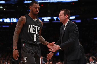 NEW YORK, NY - NOVEMBER 09:  Sean Kilpatrick #6 of the Brooklyn Nets reacts as he high fives head coach Kenny Atkinson of the Brooklyn Nets during the second half at Madison Square Garden on November 9, 2016 in New York City. NOTE TO USER: User expressly 