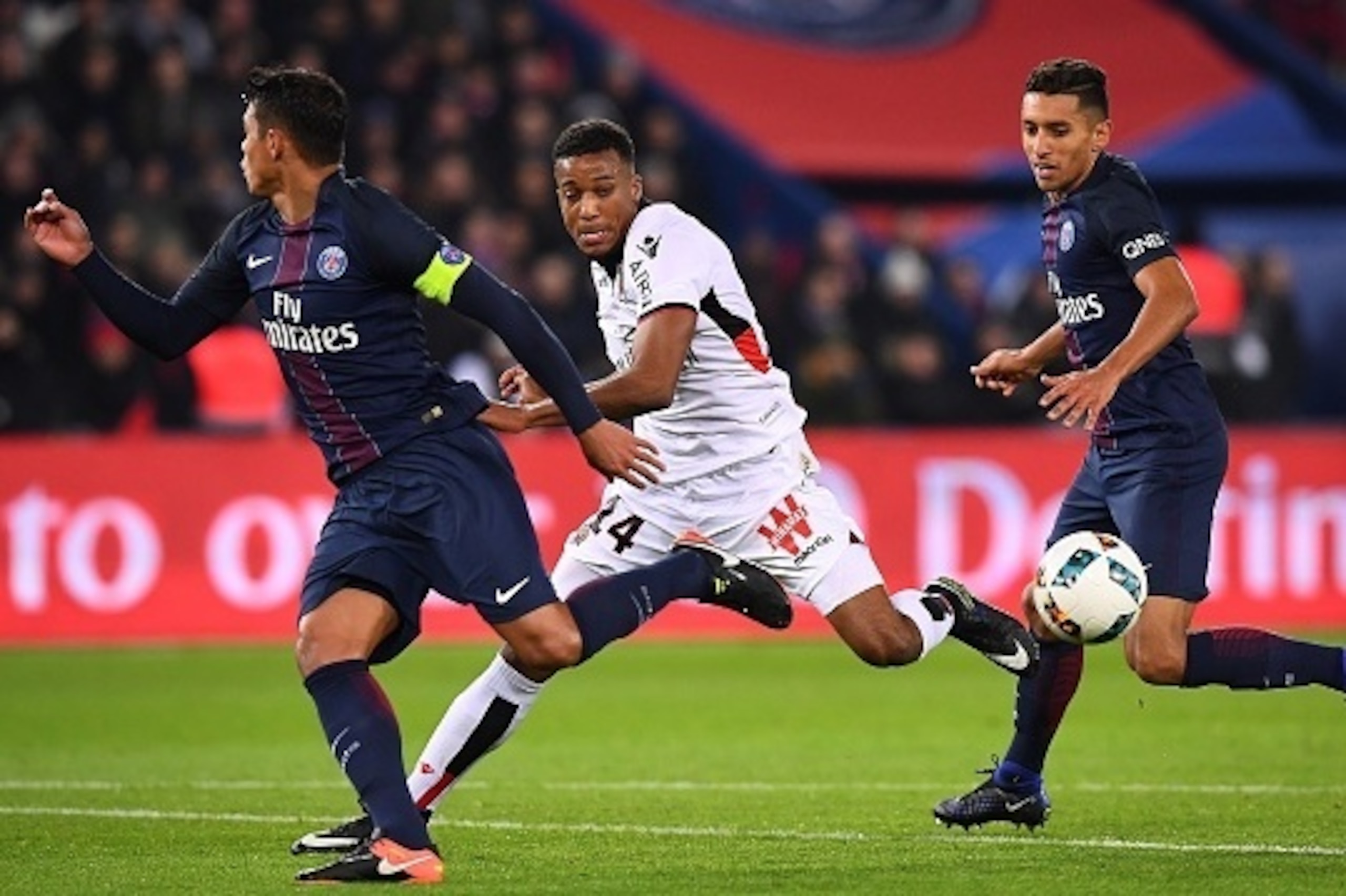 Paris Saint-Germain's Brazilian defender Thiago Silva (L) and Paris Saint-Germain's Brazilian defender Marquinhos (R) vies with Nice's French forward Alassane Plea during the French L1 football match between Paris Saint-Germain and Nice at the Parc des Pr