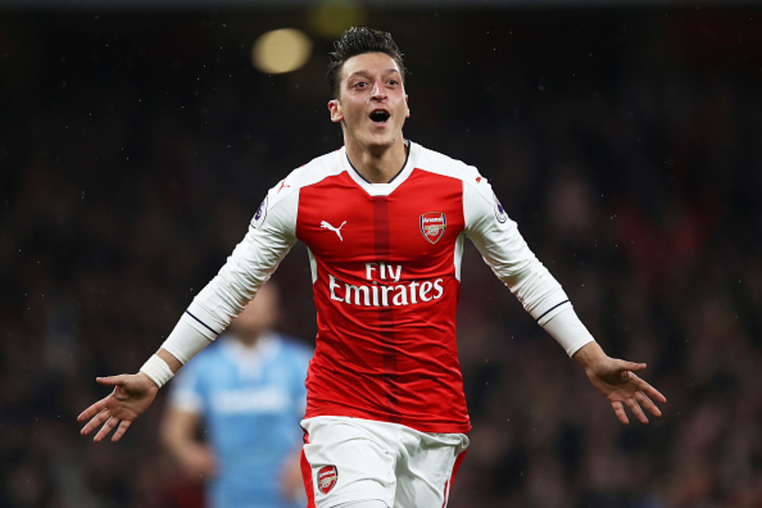 LONDON, ENGLAND - DECEMBER 10: Mesut Ozil of Arsenal celebrates scoring his sides second goal during the Premier League match between Arsenal and Stoke City at the Emirates Stadium on December 10, 2016 in London, England. (Photo by Julian Finney/Getty I LONDON, ENGLAND - DECEMBER 10: Mesut Ozil of Arsenal celebrates scoring his sides second goal during the Premier League match between Arsenal and Stoke City at the Emirates Stadium on December 10, 2016 in London, England. (Photo by Julian Finney/Getty I