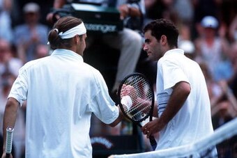 2 Jul 2001:  Pete Sampras of the USA congratulates Roger Federer of Switzerland following his victory during the men's fourth round of The All England Lawn Tennis Championship at Wimbledon, London.  Mandatory Credit: Clive Brunskill/ALLSPORT