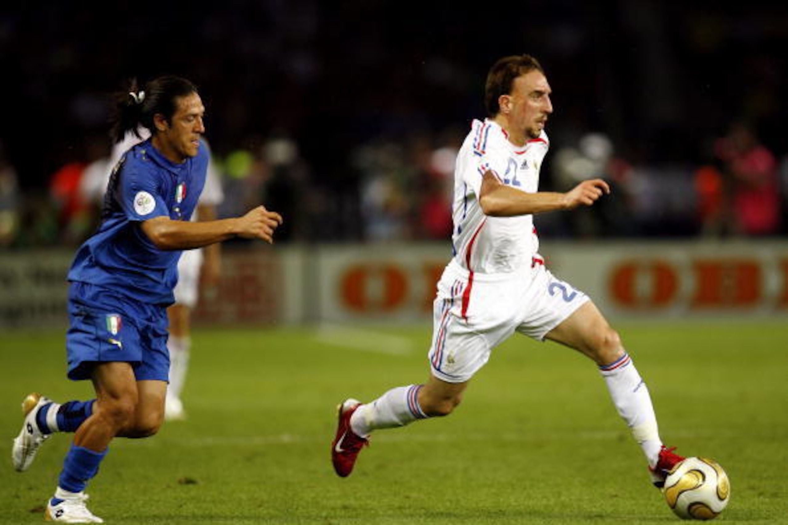 BERLIN - JULY 09: Frank Ribery (R) of France takes the ball past Mauro Camoranesi of Italy during the FIFA World Cup Germany 2006 Final match between Italy and France at the Olympic Stadium on July 9, 2006 in Berlin, Germany.
(Photo by Michael Steele/G BERLIN - JULY 09: Frank Ribery (R) of France takes the ball past Mauro Camoranesi of Italy during the FIFA World Cup Germany 2006 Final match between Italy and France at the Olympic Stadium on July 9, 2006 in Berlin, Germany.
(Photo by Michael Steele/G