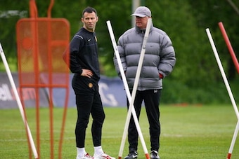 MANCHESTER, UNITED KINGDOM - MAY 04:  Ryan Giggs of Manchester United talks with Sir Alex Ferguson the manager of Manchester United during a training session at the Carrington Training Complex on May 4, 2009 in Manchester, England.  (Photo by Alex Livesey