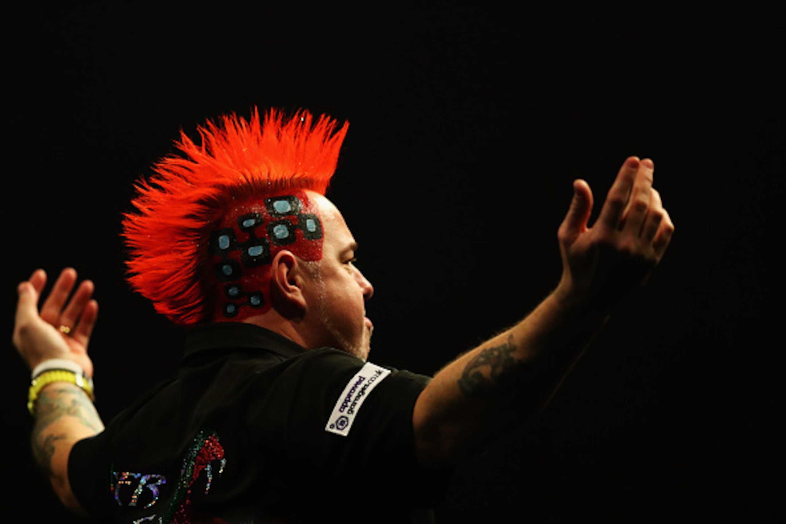 ROTTERDAM, NETHERLANDS - MAY 12: Peter Wright of Scotland dances for the fans before he plays against Raymond van Barneveld of the Netherlands during the Darts Betway Premier League Night 15 at Rotterdam Ahoy on May 12, 2016 in Rotterdam, . (Photo by De ROTTERDAM, NETHERLANDS - MAY 12: Peter Wright of Scotland dances for the fans before he plays against Raymond van Barneveld of the Netherlands during the Darts Betway Premier League Night 15 at Rotterdam Ahoy on May 12, 2016 in Rotterdam, . (Photo by De