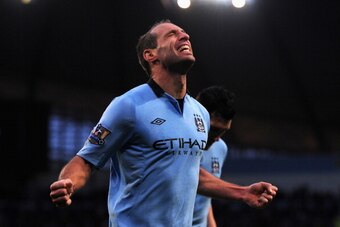 MANCHESTER, ENGLAND - JANUARY 01:  Pablo Zabaleta of Manchester City celebrates scoring the opening goal during the Barclays Premier League match between Manchester City and Stoke City at the Etihad Stadium on January 1, 2013 in Manchester, England.  (Pho